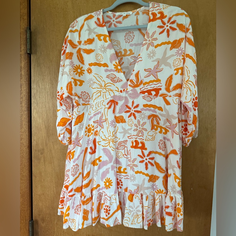 Beachy V-Neck Dress with Ruffle Hem